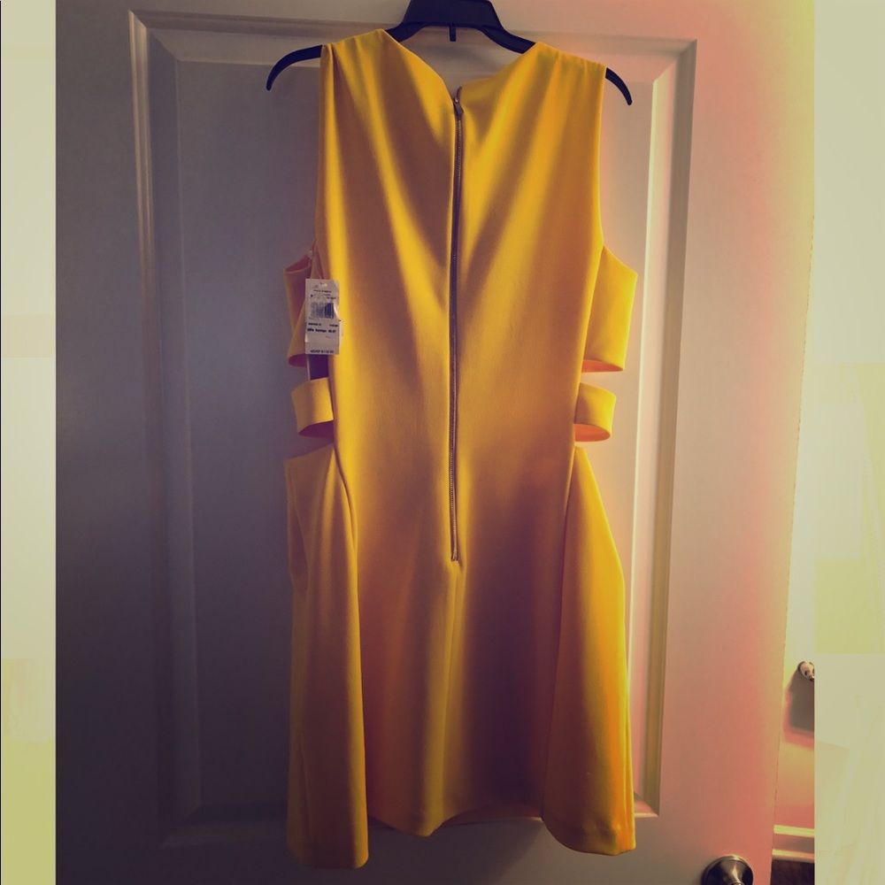 1. State yellow cut out dress